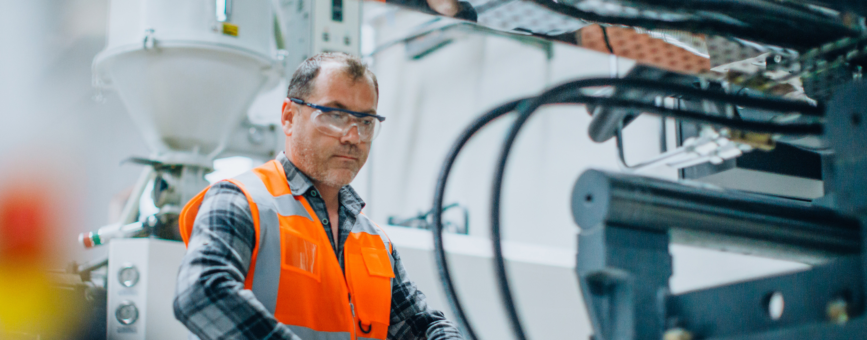 industrial worker working on machine