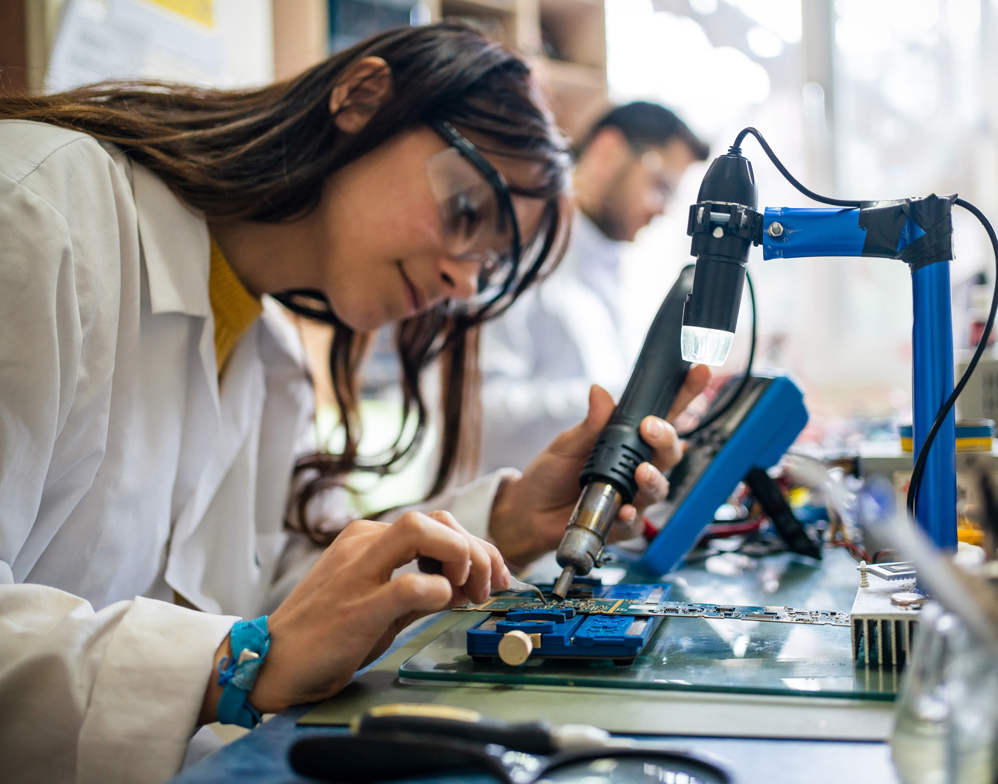 people working in advanced manufacturing